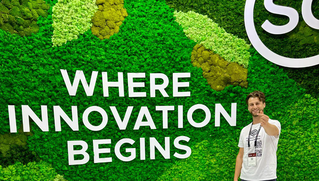 Where innovation begins — Alexander Zahari in front of a green moss wall at SWITCH Singapore 2024